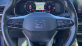 Volant Seat Leon FR – intérieur sportif d’un véhicule hybride d'occasion à Carcassonne / voiture occasion Carcassonne
